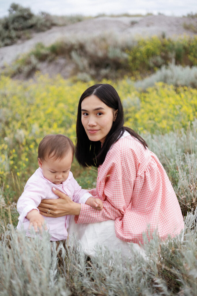 claudia spaurel with her son in a field on the saskatchewan prairies